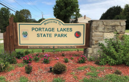 Photo of the Portage Lakes State Park entrance sign